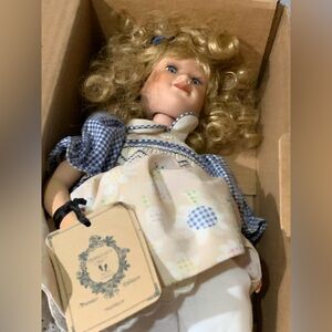 Charming Doll with Blue Dress and Blonde Curls